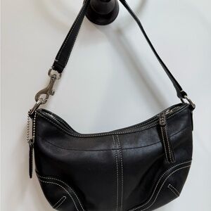 Coach vintage Black small Leather Wrist or short Shoulder Bag with Sleek Design